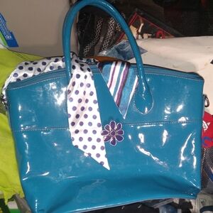 Stylish Blue Handbag with Scarf Accent